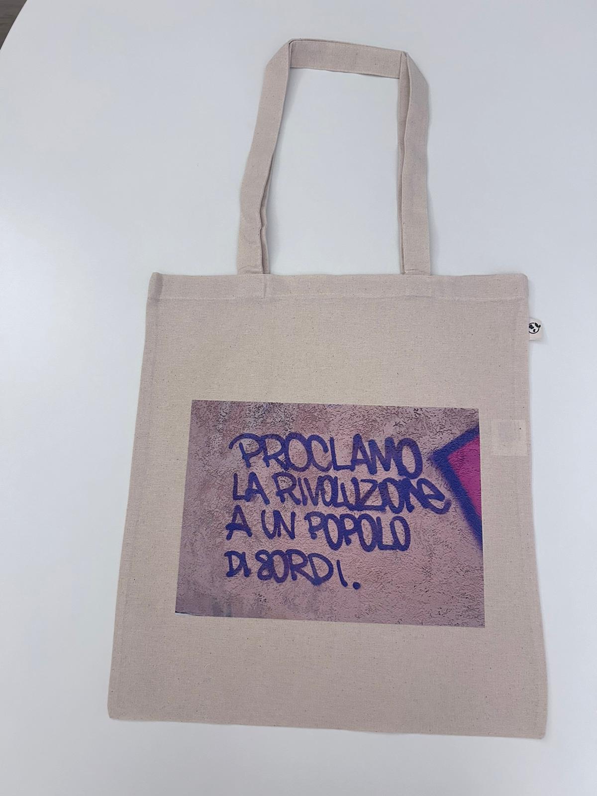 Shopper in tela "Proclamo una rivoluzione a un popolo di sordi"